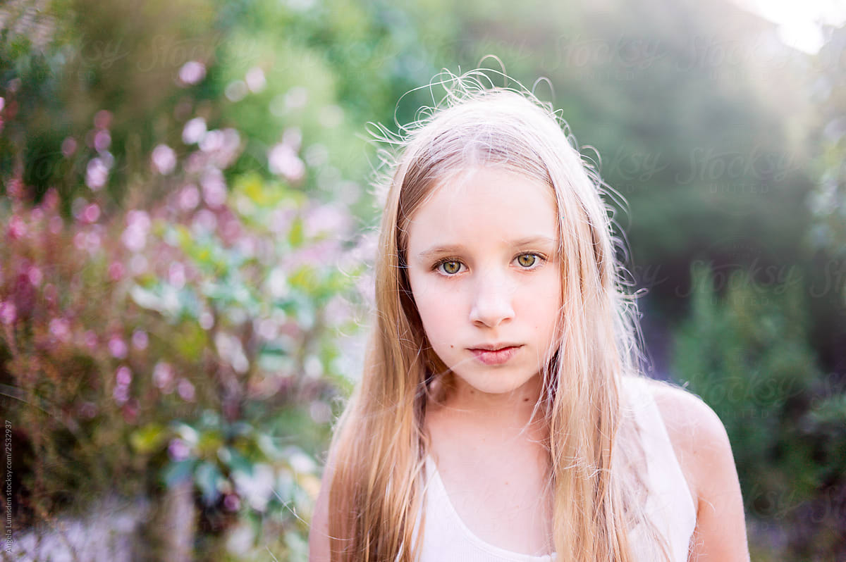 Young Girl Outdoors In Summer By Angela Lumsden