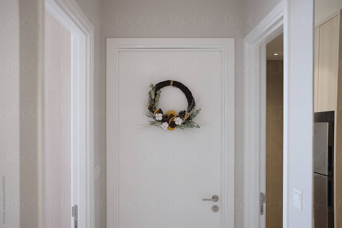 Minimalism wreath on the white door