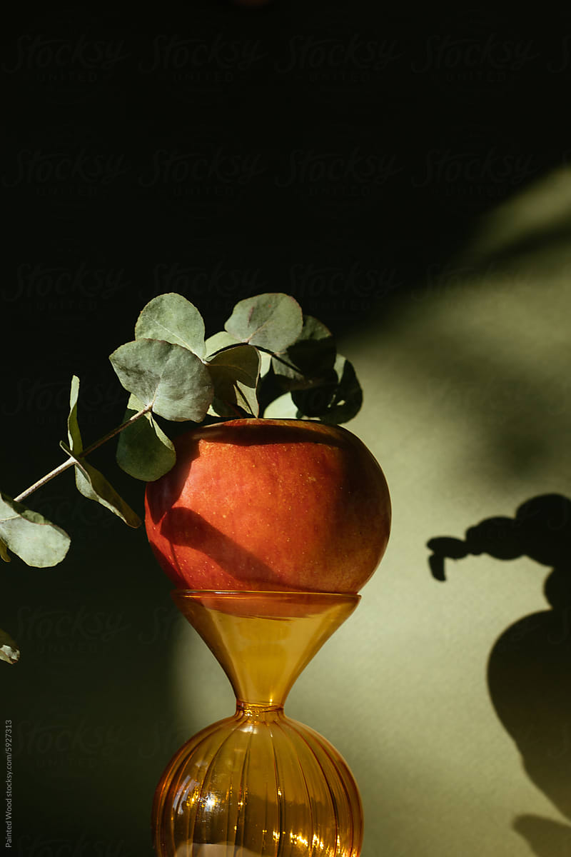 Beautiful single apple on a vase