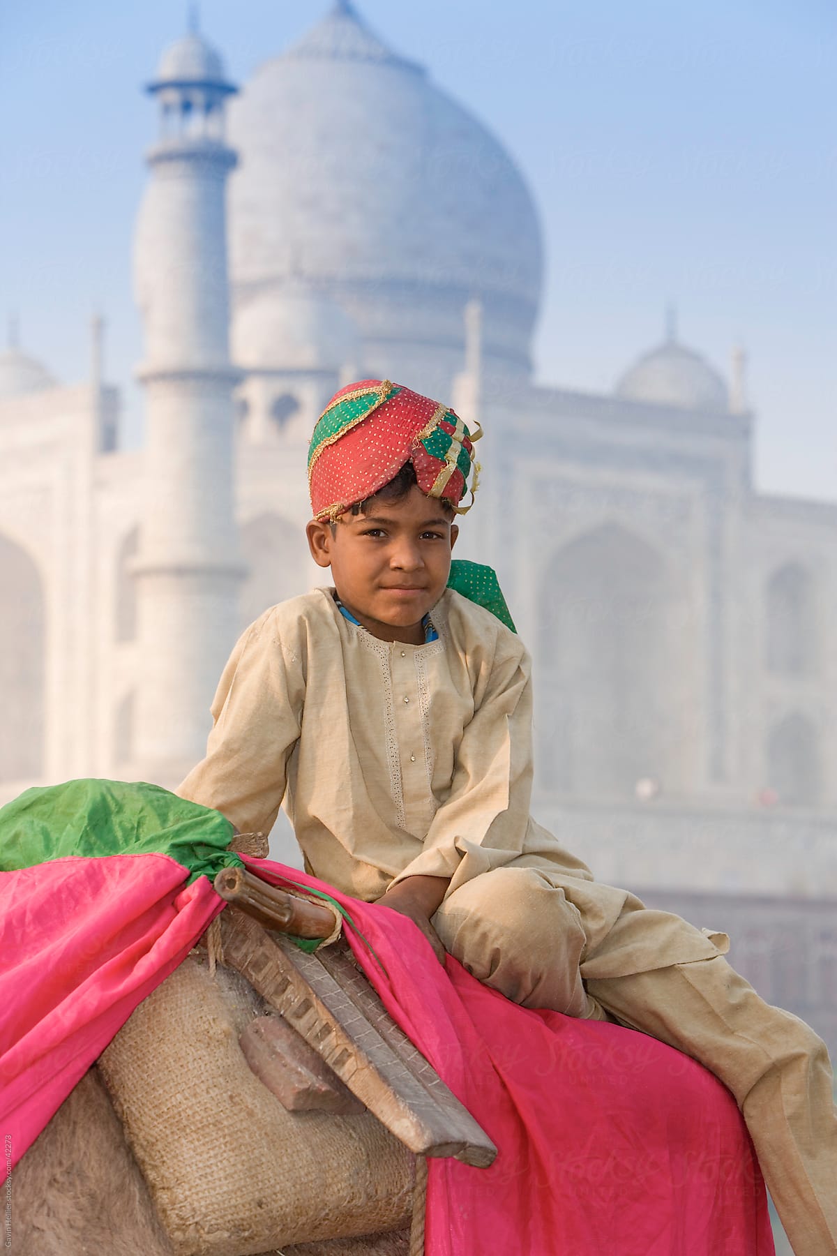 India, Uttar Pradesh, The Taj Mahal, young boy sitting on his camel