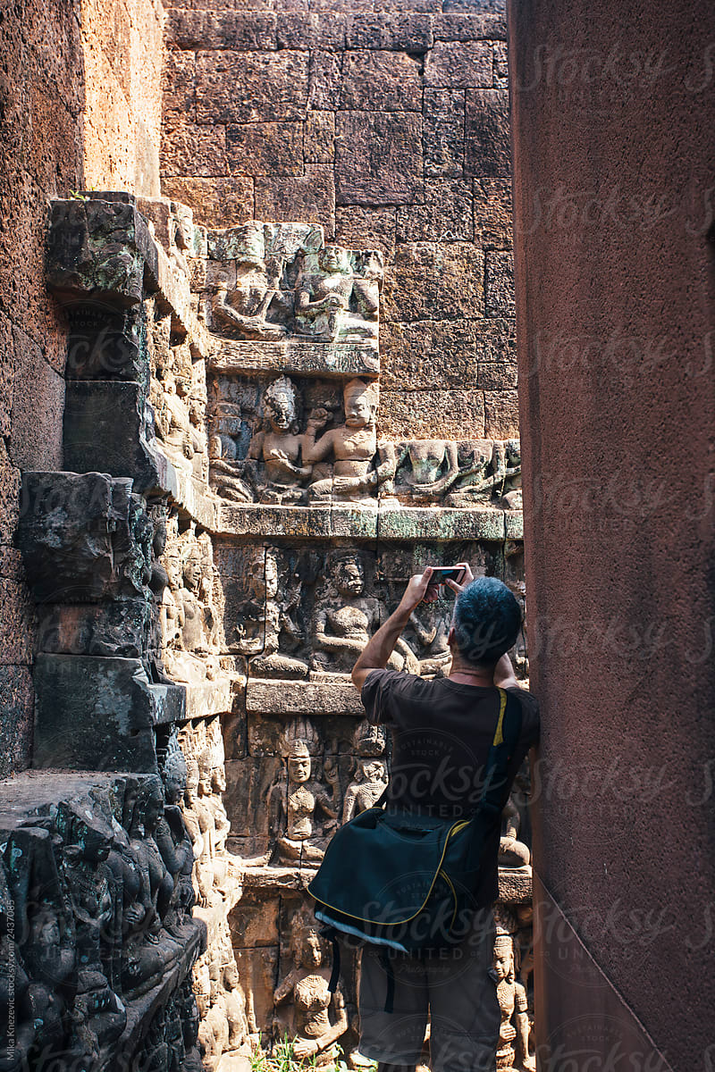 Tourist Taking photo in Ankgor Wat Temple in Cambodia