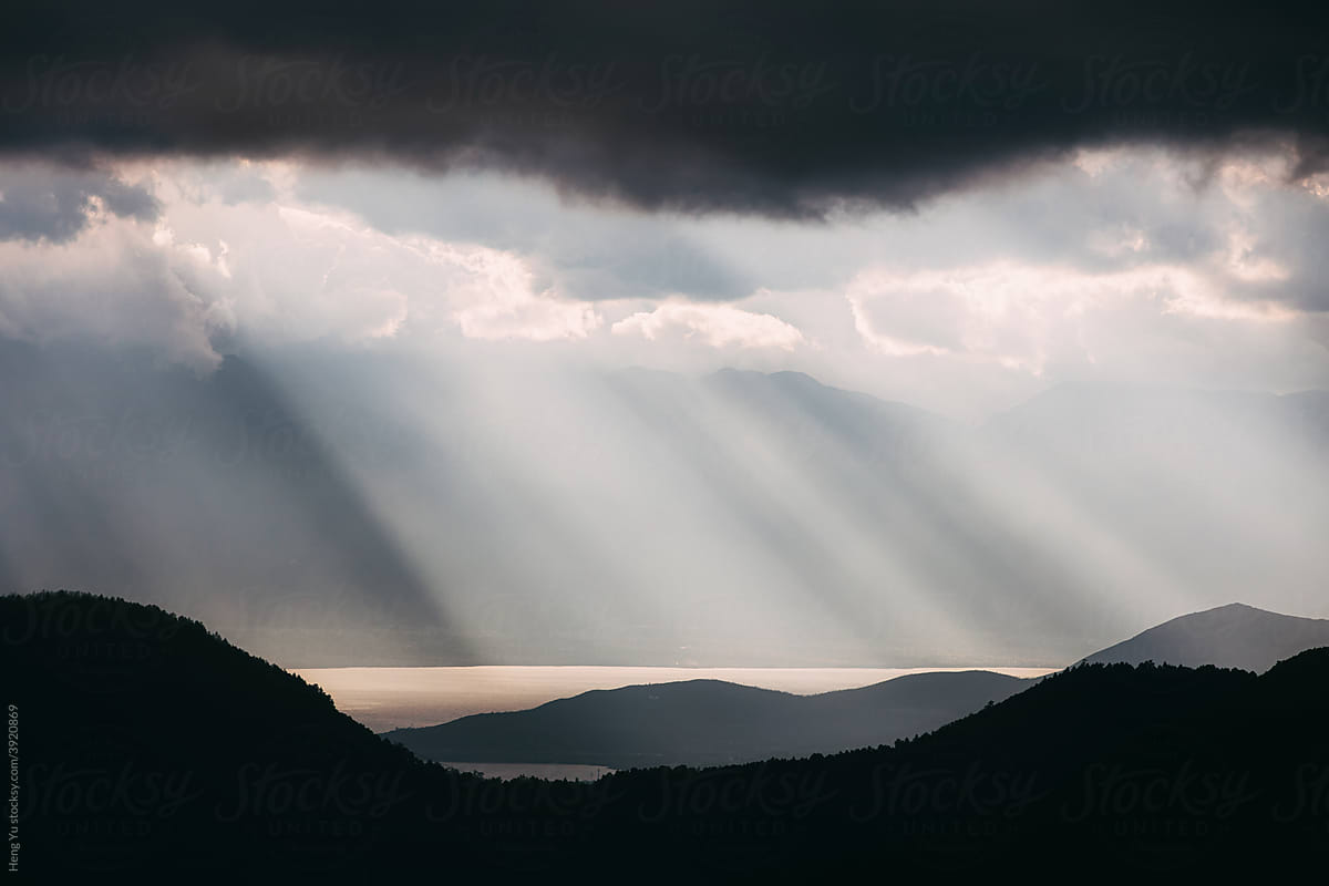Rays Of Sunlight breaking through clouds