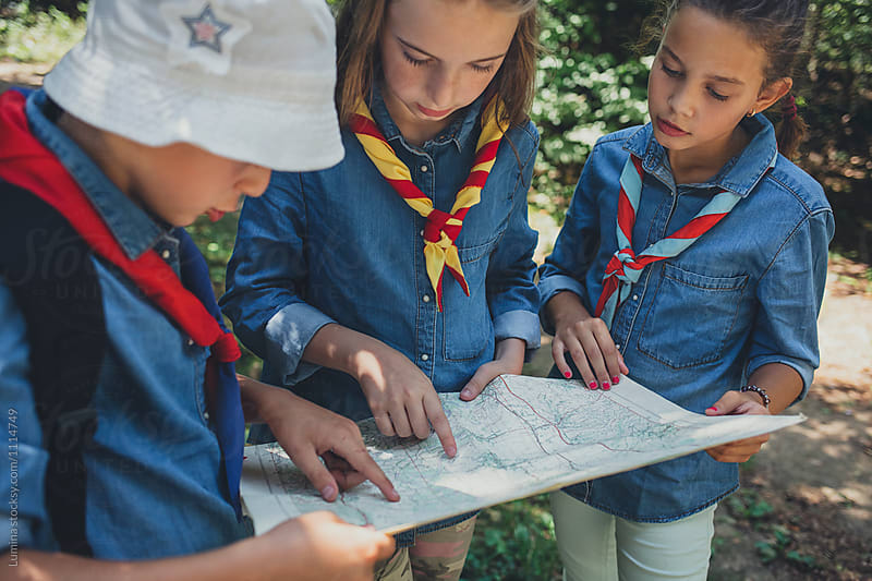 Childern Scouts Learning Orinetation Using A Map
