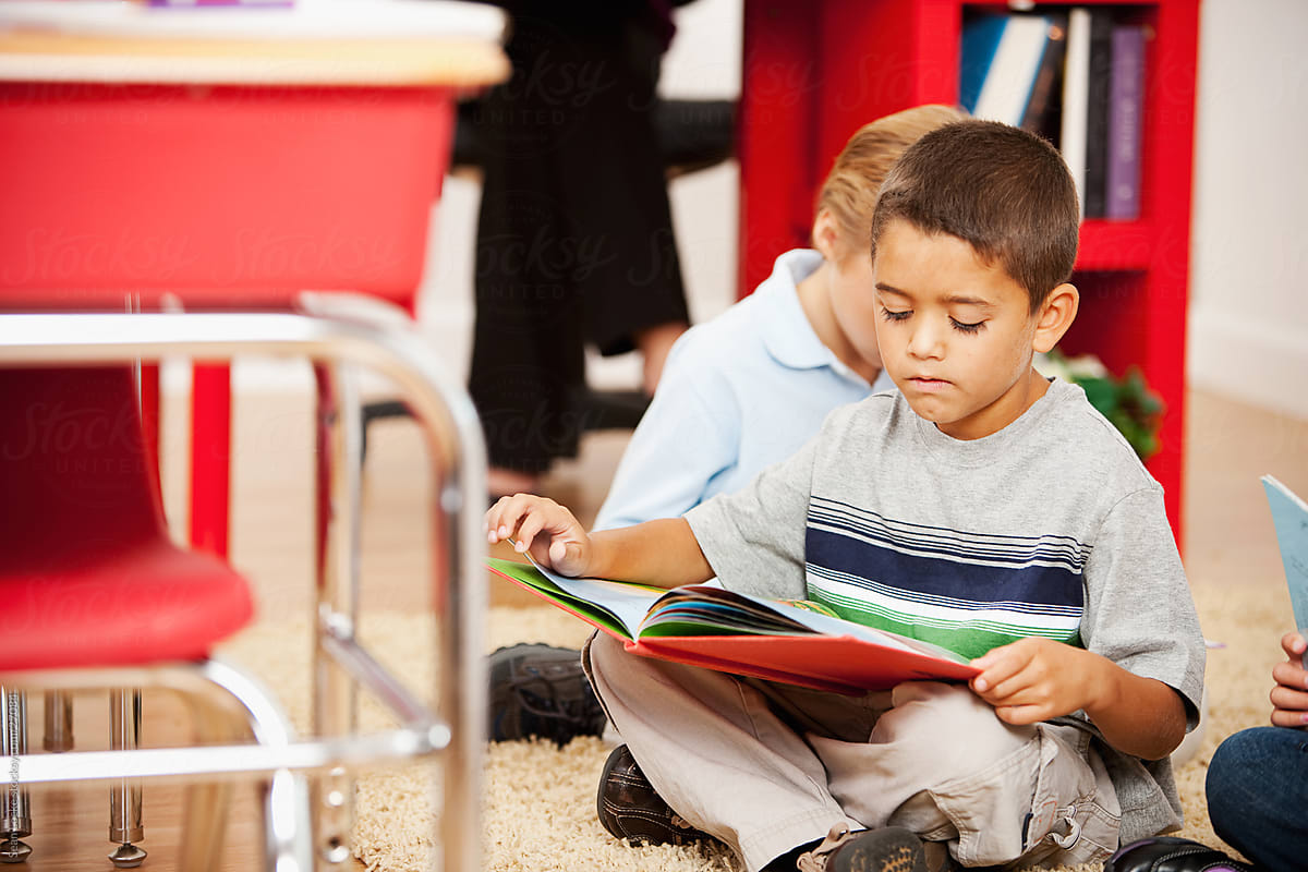 Classroom: Hispanic Boy Reading Story