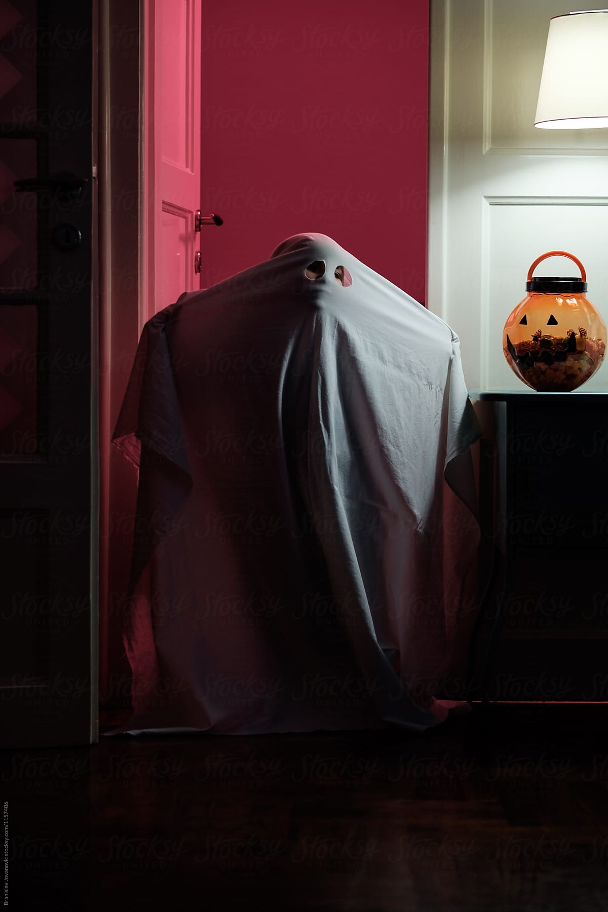 Little Boy Dressed In Ghost Costume For Halloween Trick Or Treat