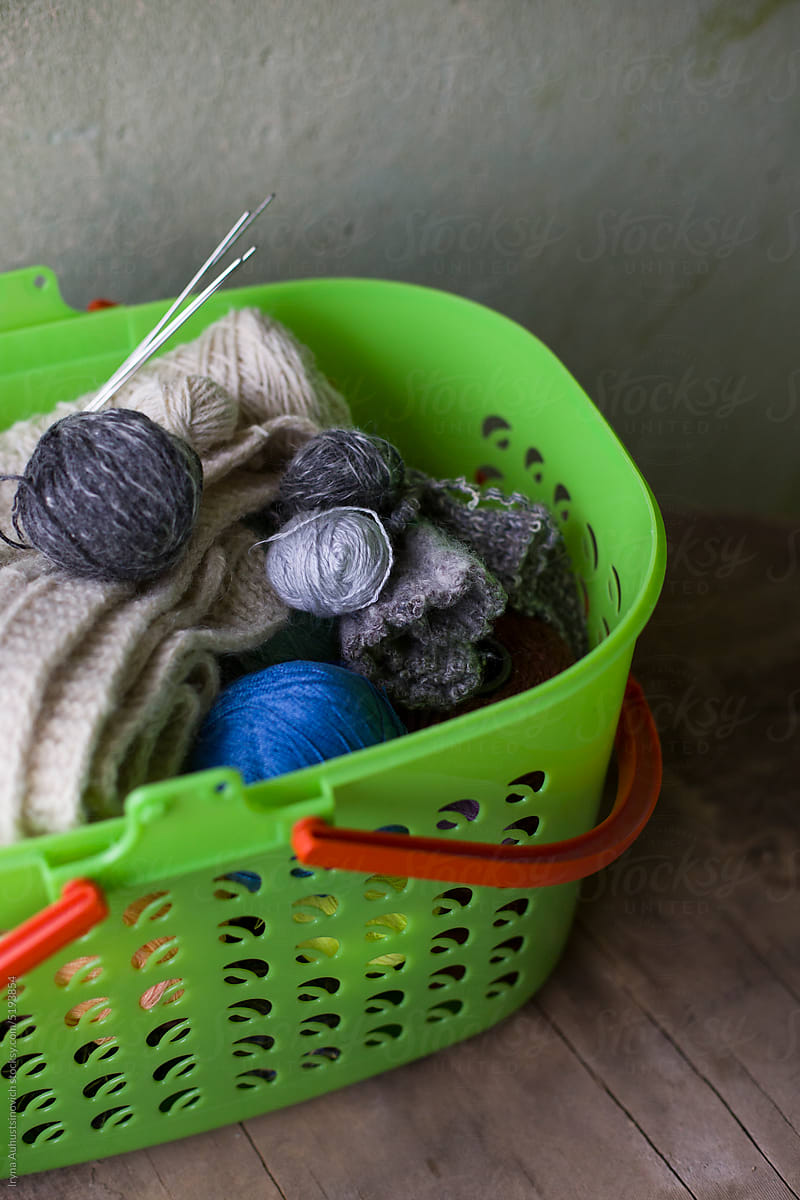 balls of yarn for knitting in the basket