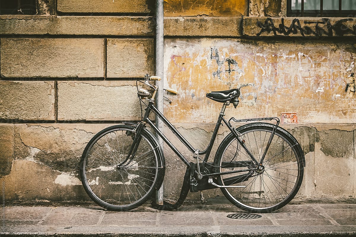 Old-Fashioned Bicycle Locked in an Italian Street