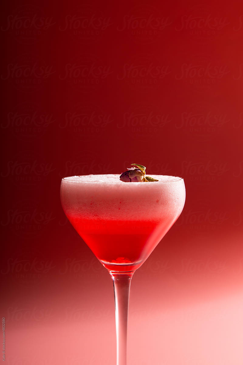 Cocktail drink on pink background