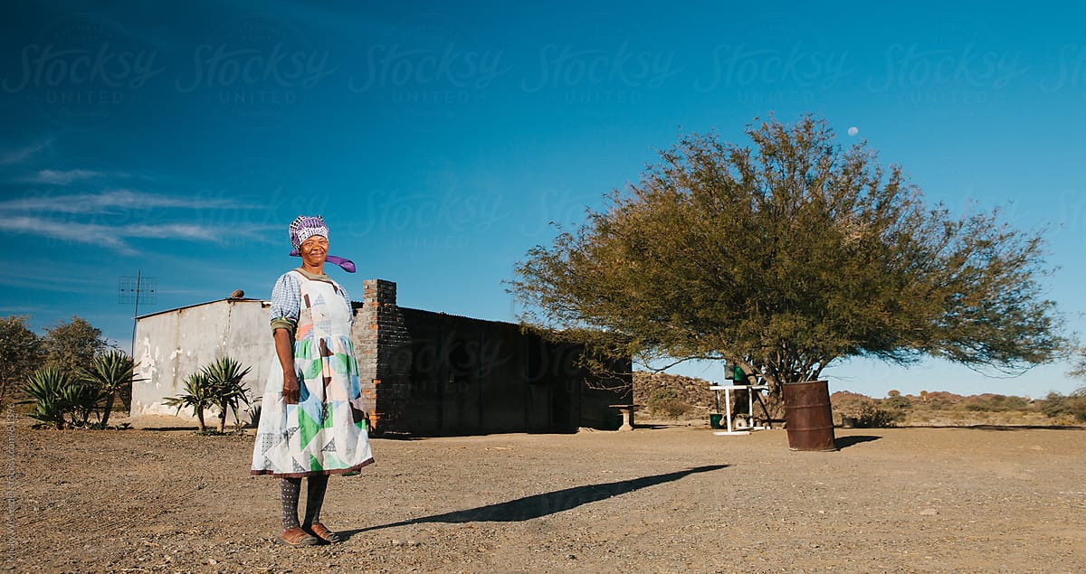 Namibian Nama woman standing outside her home