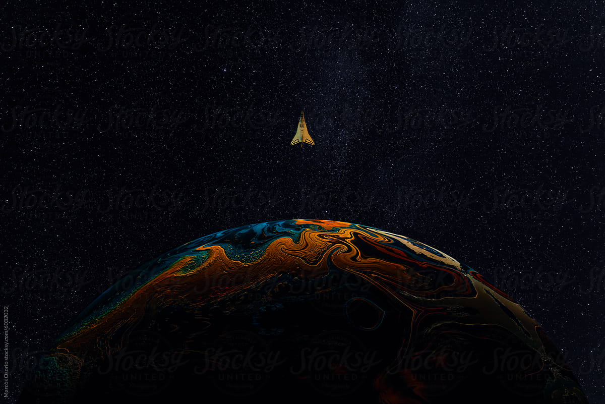 Space shuttle orbiting colorful planet in starry space
