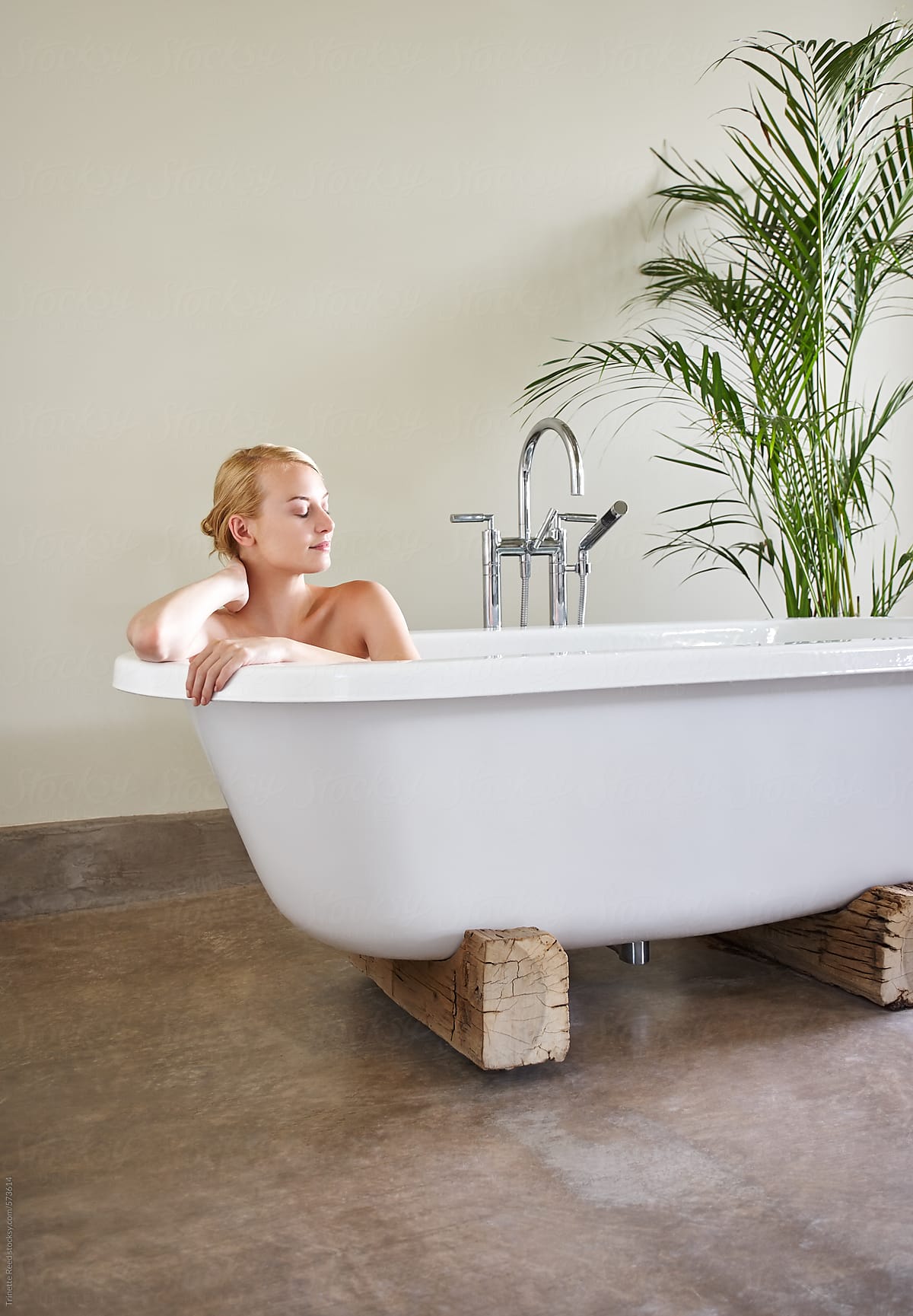 Woman Taking A Bath In Luxury Bathroom by Stocksy Contributor Trinette  Reed - Stocksy