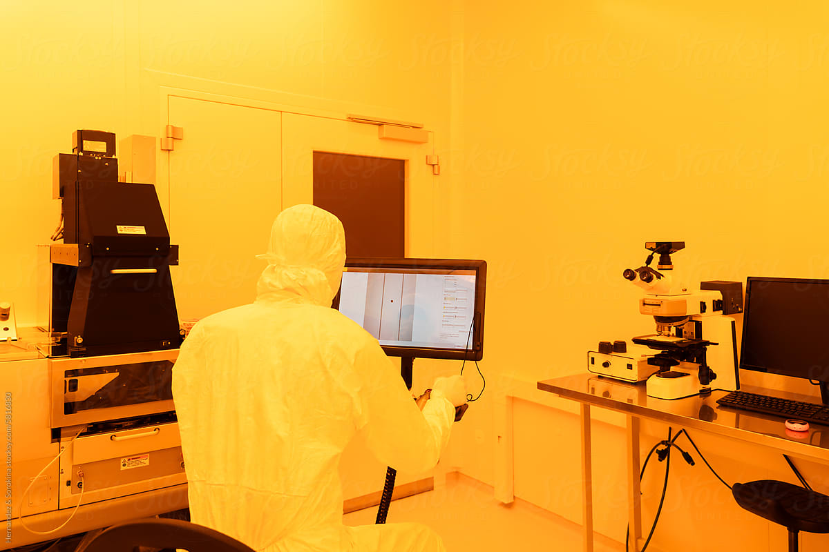 Researcher Using Lithography device In Yellow Clean Room