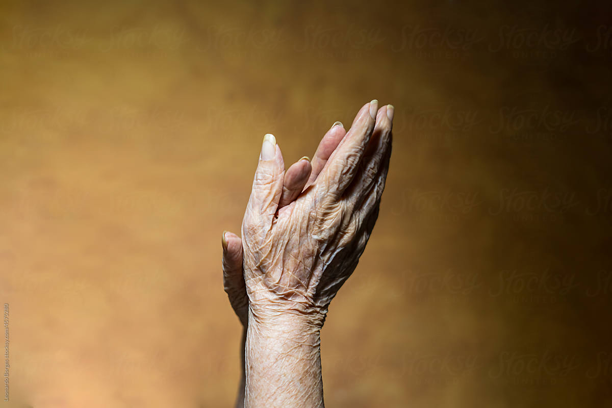 hands of an unknown old person