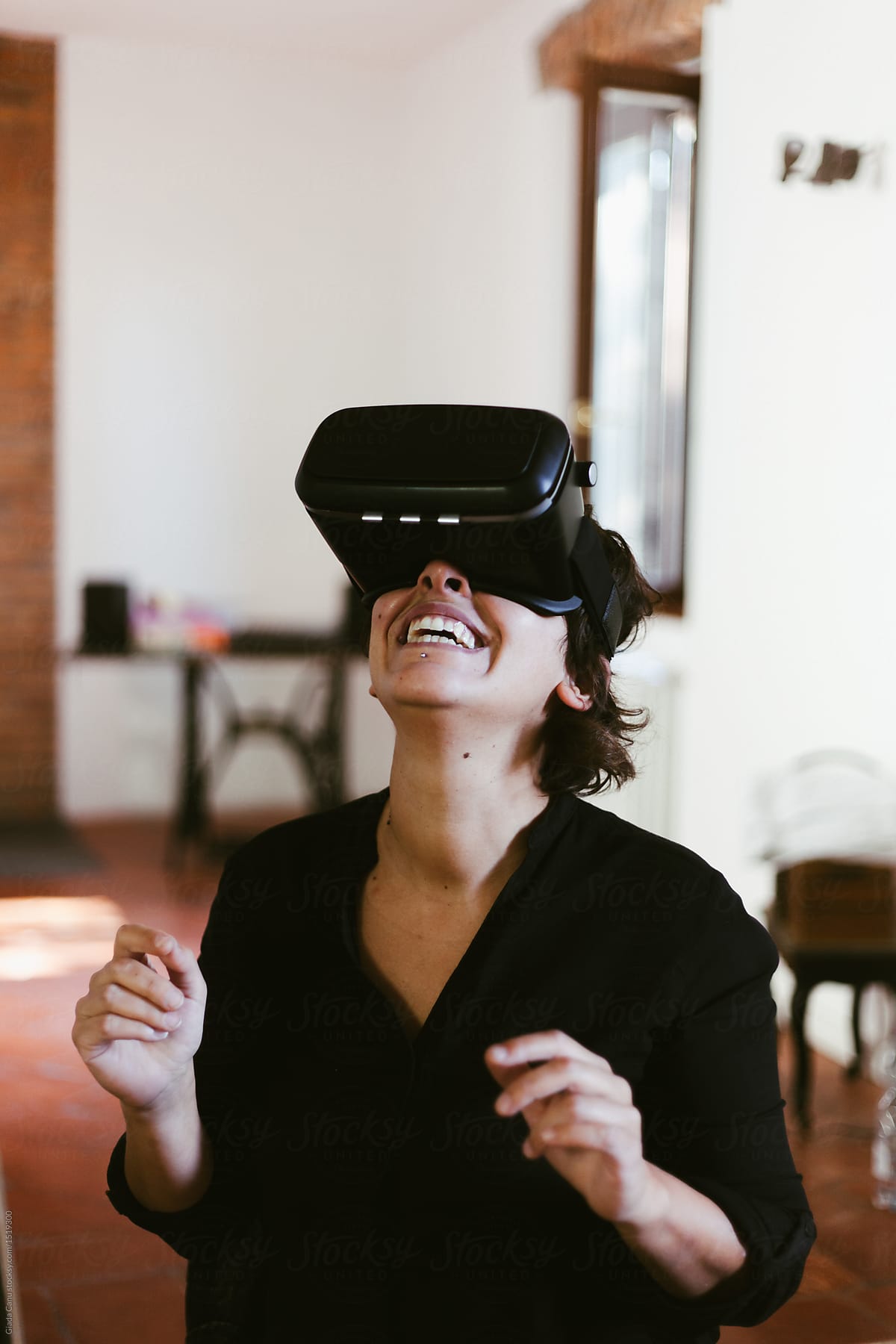 Woman using VR glasses for the first time
