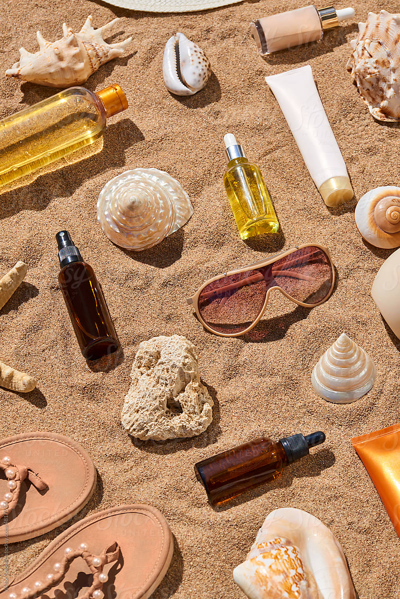 Set of accessories and cosmetics summer style in sand