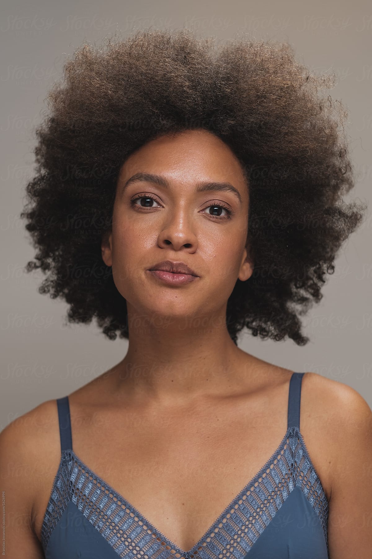 Beautiful Mixed Race Woman With Afro Hairstyle Wearing Bra By Stocksy