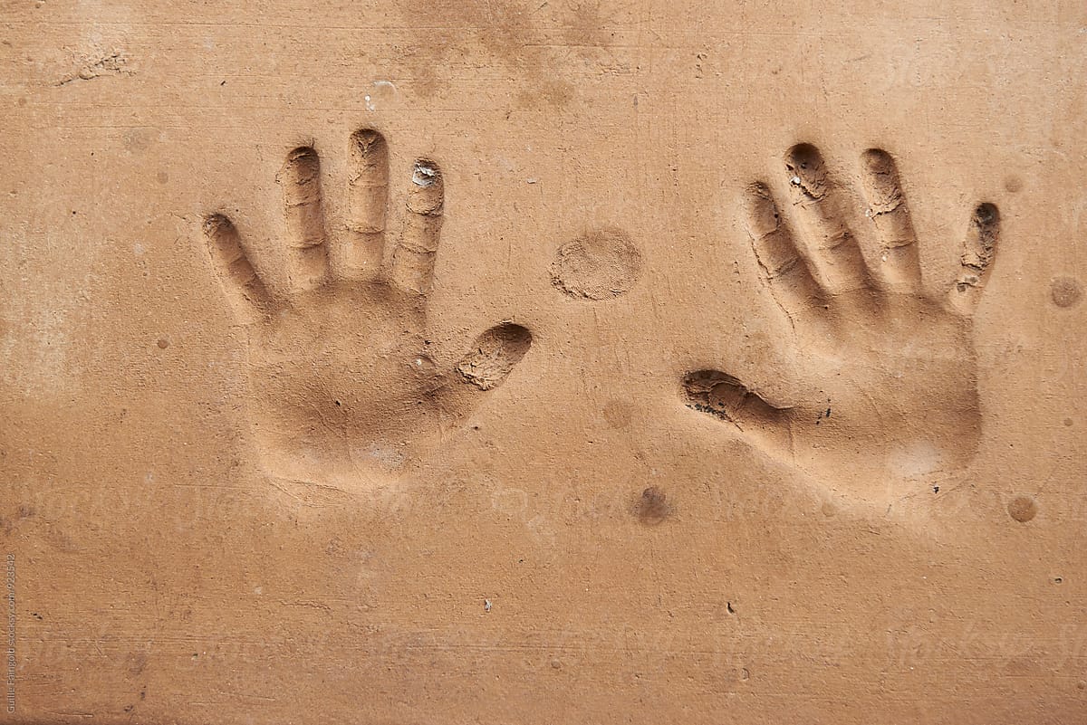 Handprint on cement wall