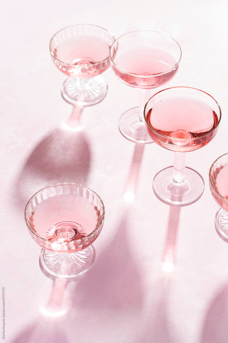 Glasses of Rose on Pink Background