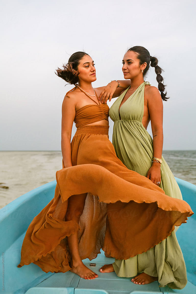 Latin Women Embracing the Sea