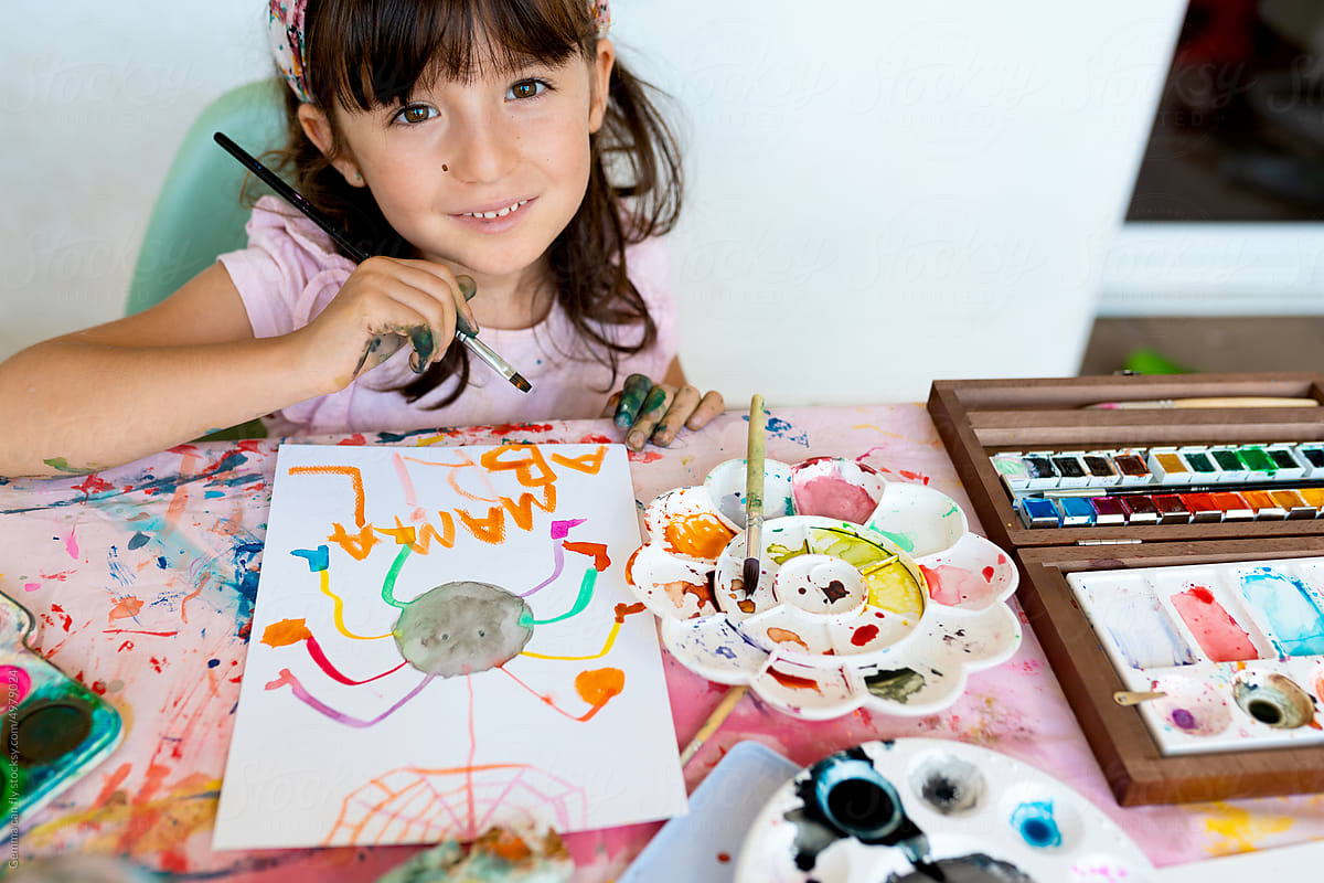 Little Girl Painting and drawing with Watercolor