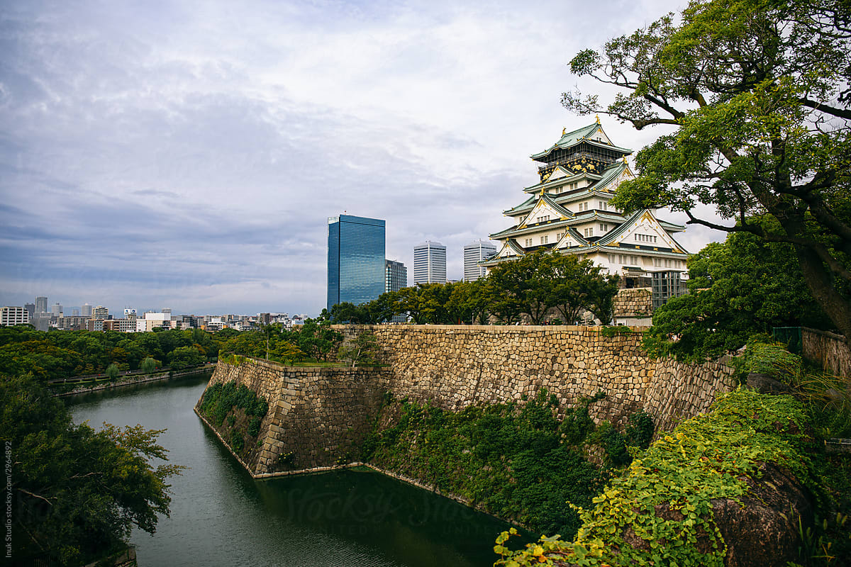 Cityscape with old Osaka Castle and modern skyscrapers