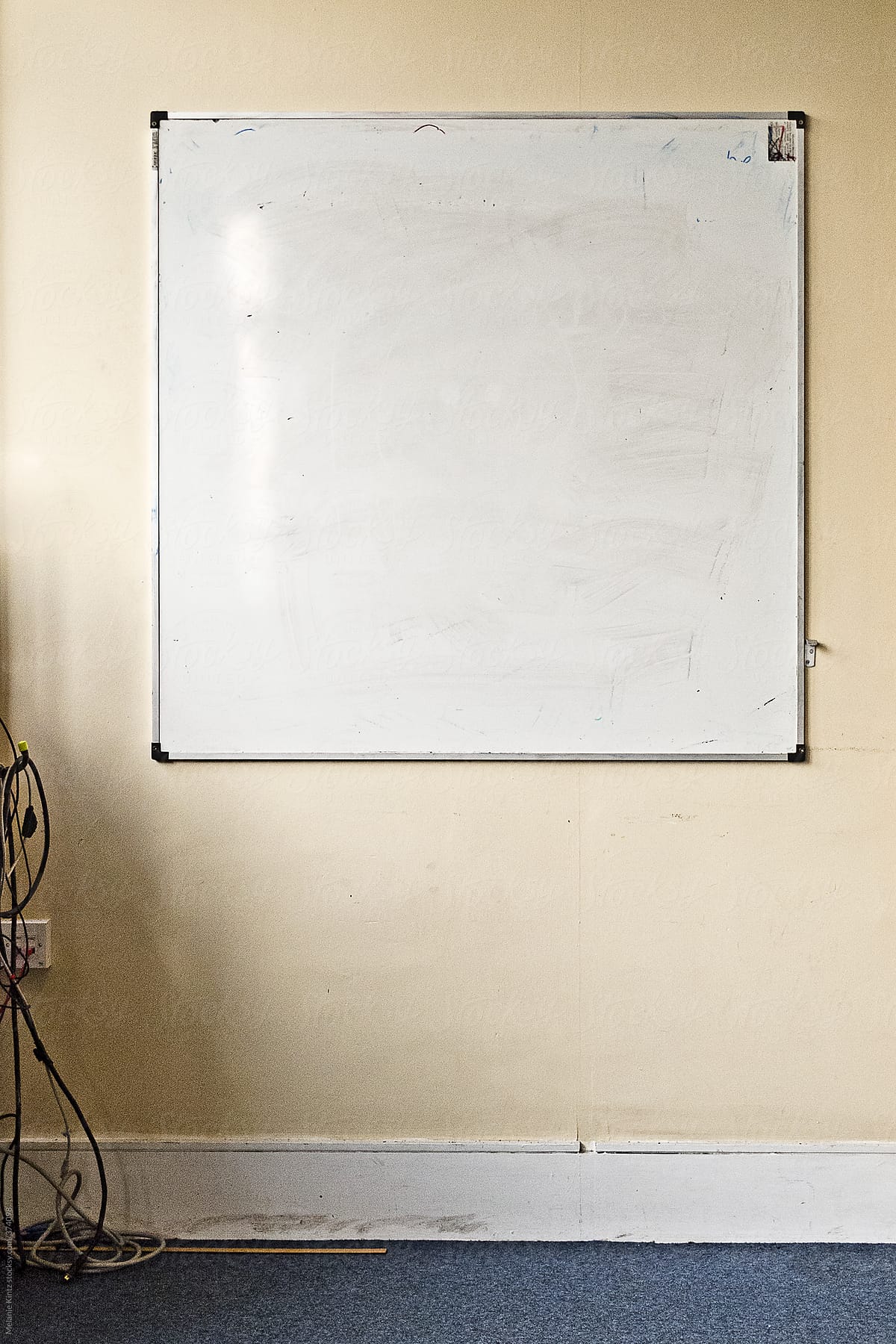 Dirty whiteboard in classroom