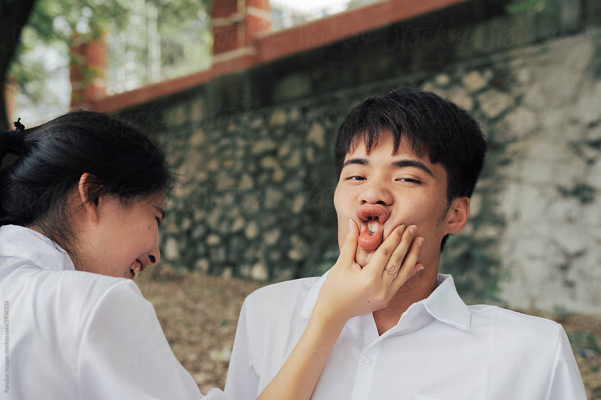 Young Asian College Couple By Stocksy Contributor Pansfun Images