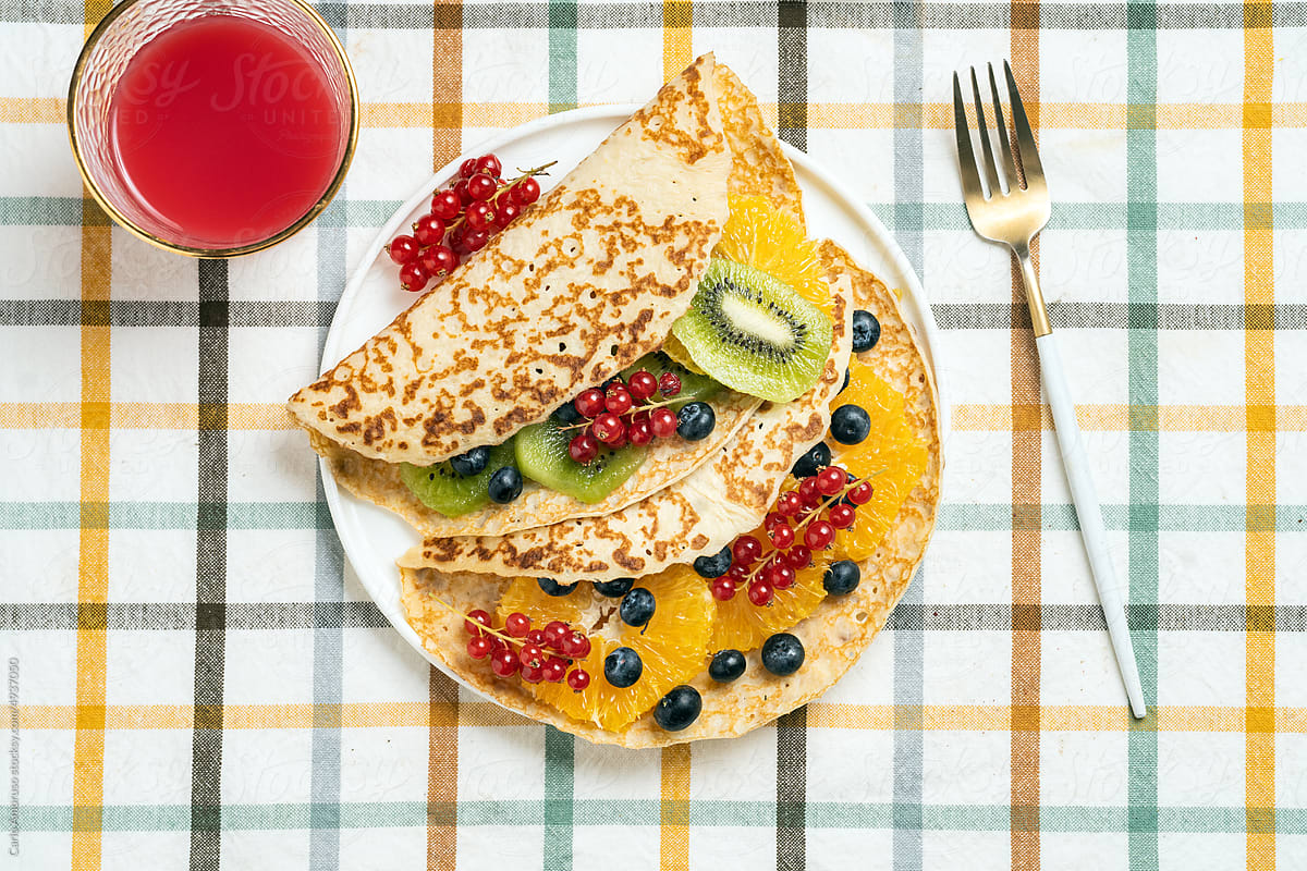 Sweet Crepes with fresh fruit and berries