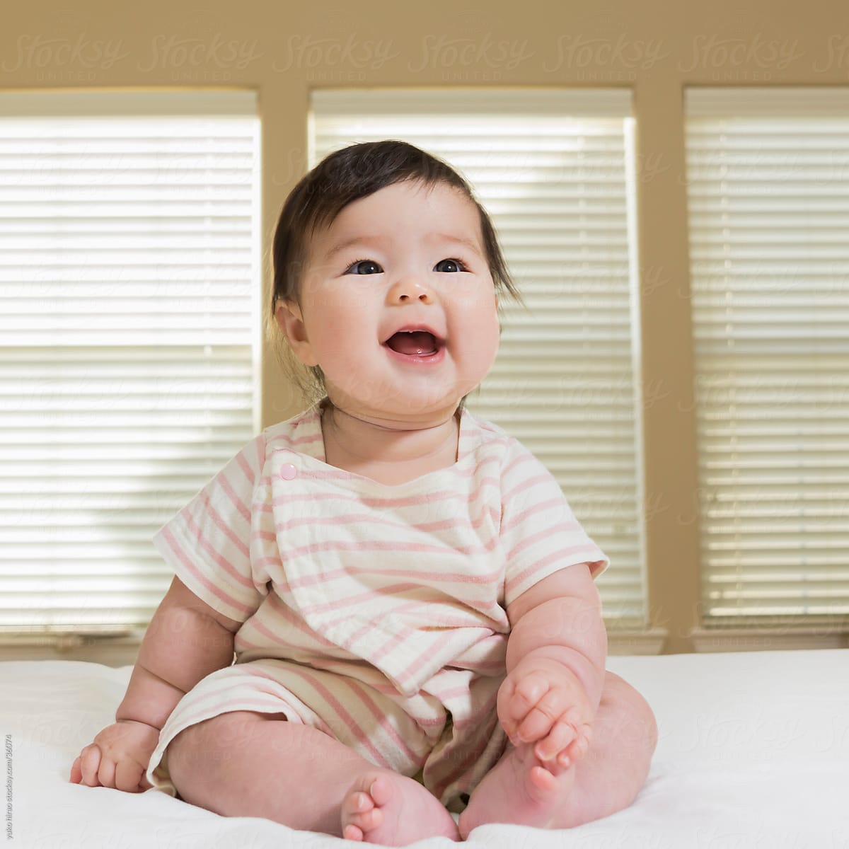 Laughing baby girl portrait