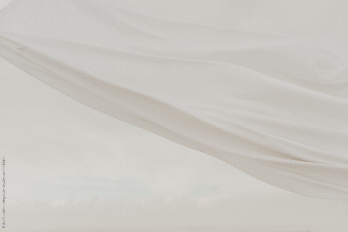 White fabric blowing in the wind