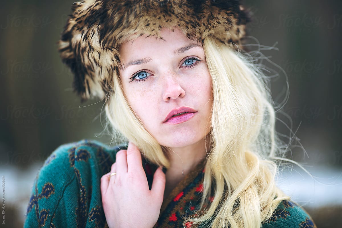 Portrait Of A Beautiful Woman With Freckles And Blue Eyes By Stocksy Contributor Jovana