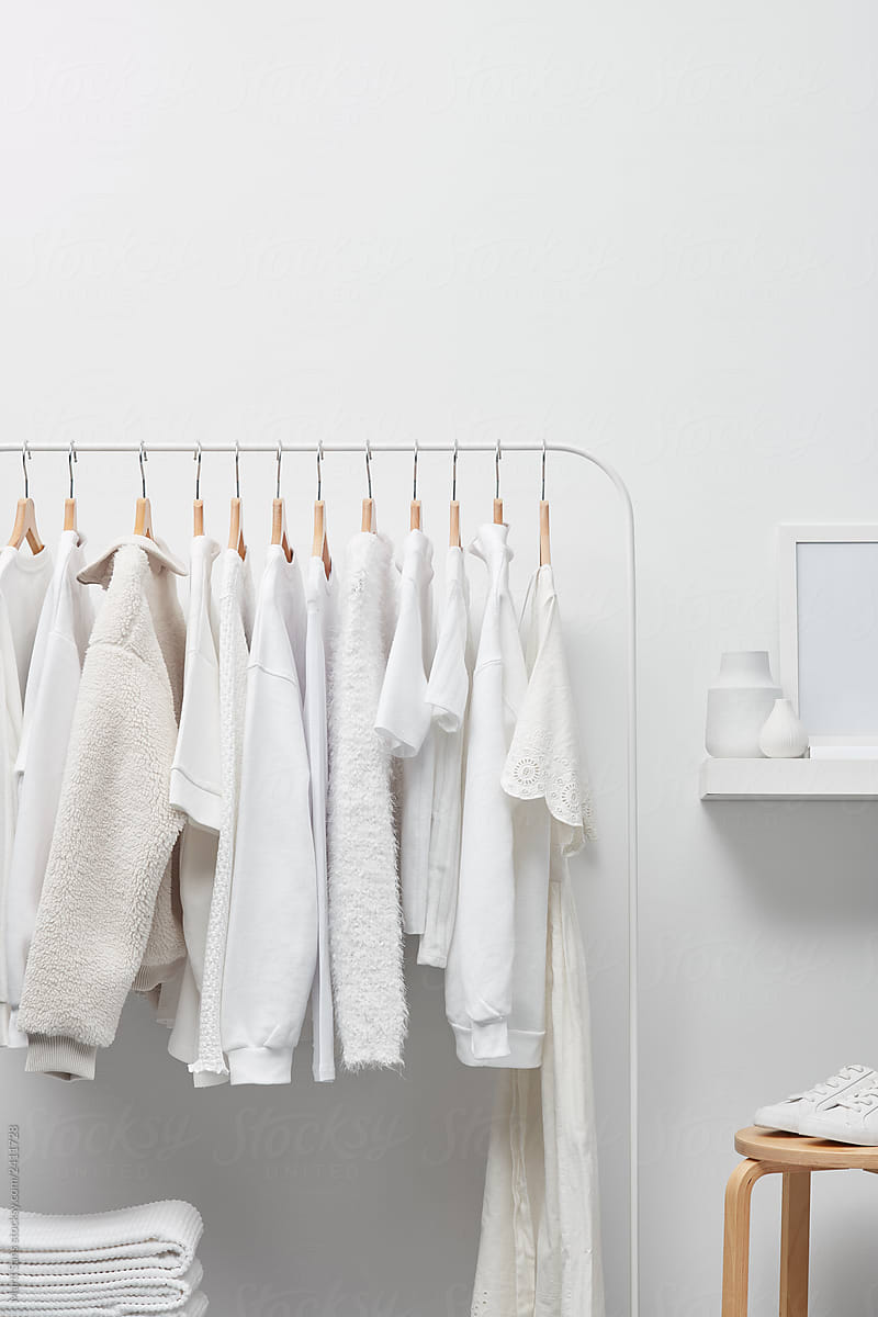 Wardrobe Interior With White Clothes by Stocksy Contributor