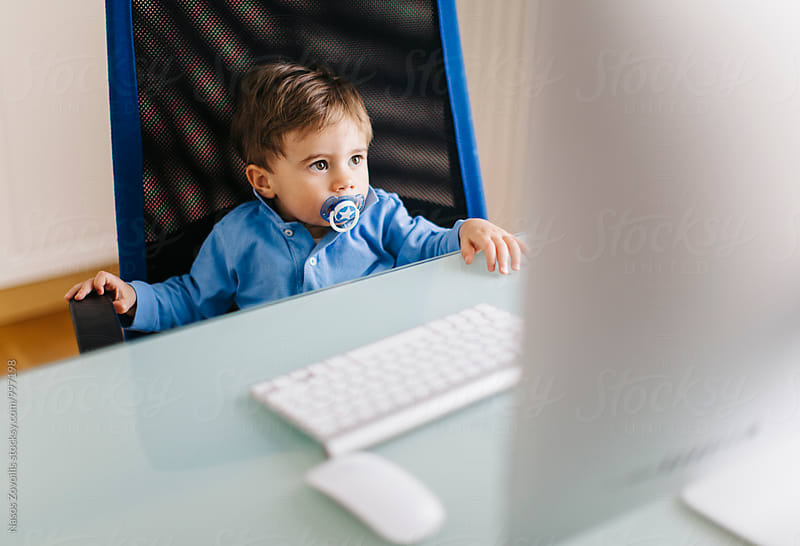 1 year old boy in front of a PC