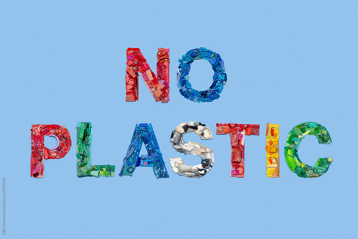 Pieces of colourful plastic in form of word NO PLASTIC