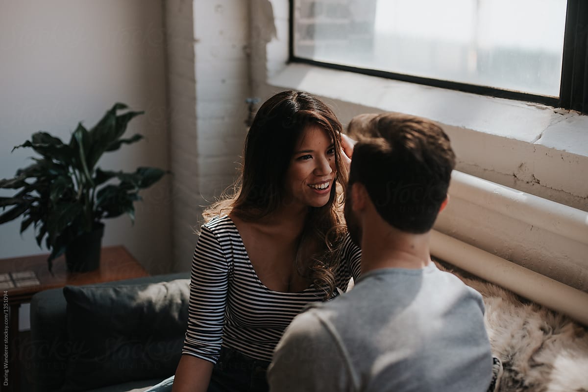 Attractive Young Interracial Couple In Trendy Loft Apartment By Stocksy Contributor Jess 9905