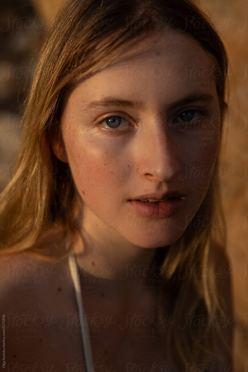 Blonde Woman No Make-up During Golden Hour