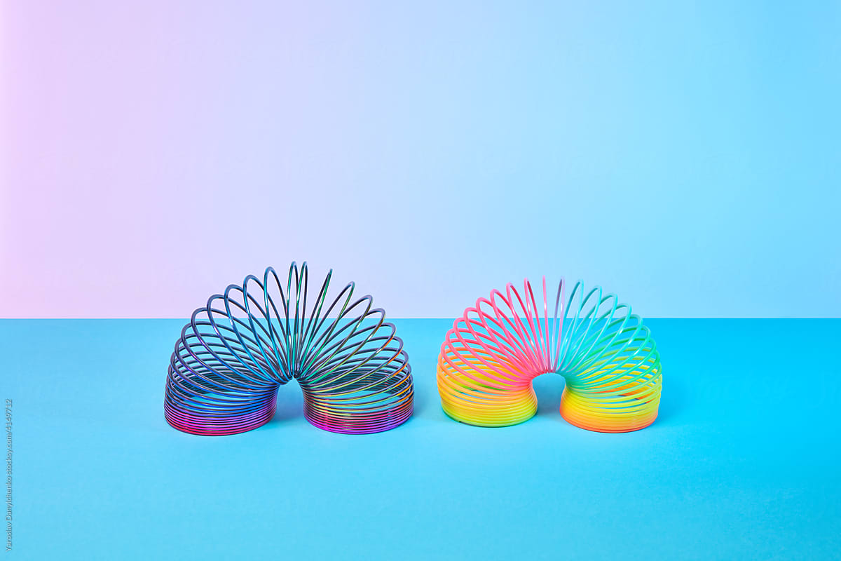 Blue and rainbow helical spring toys