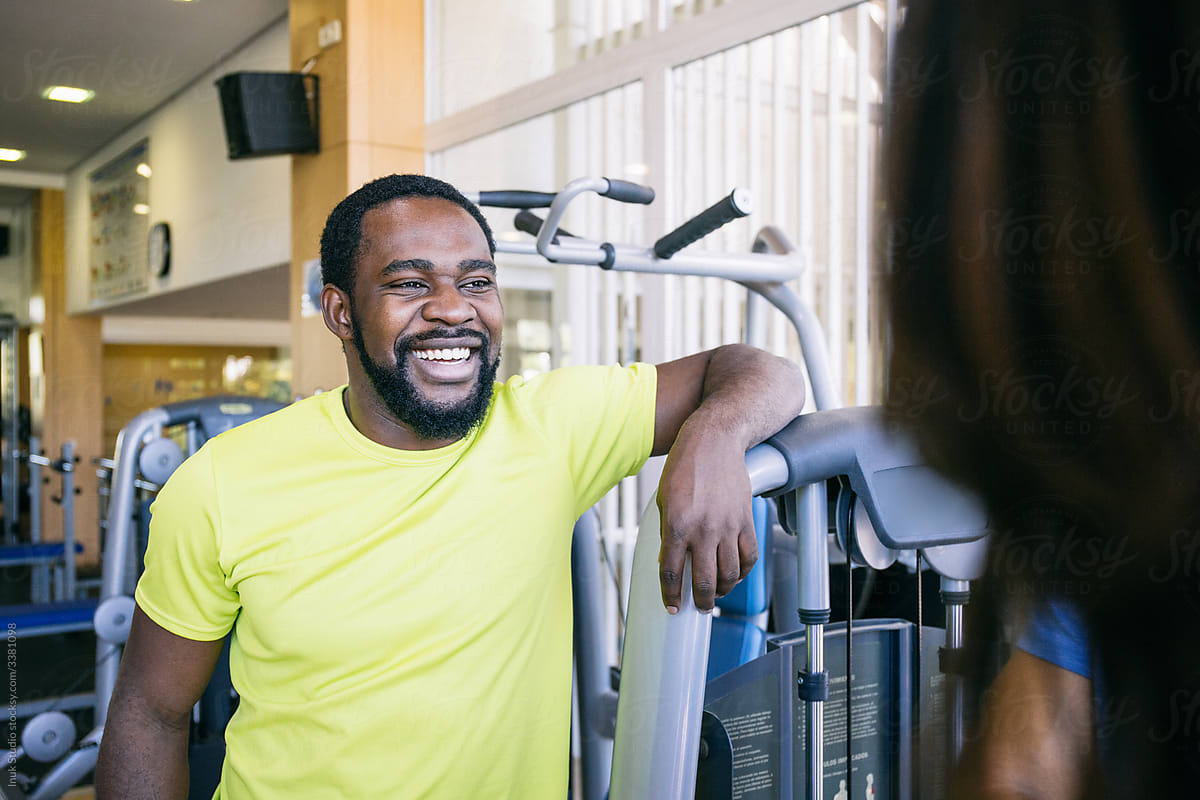 Happy African-American man in gym