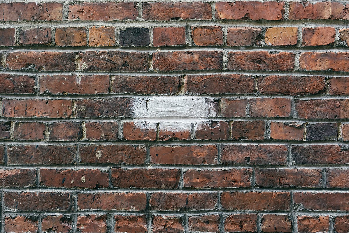 Painted silver brick on building wall