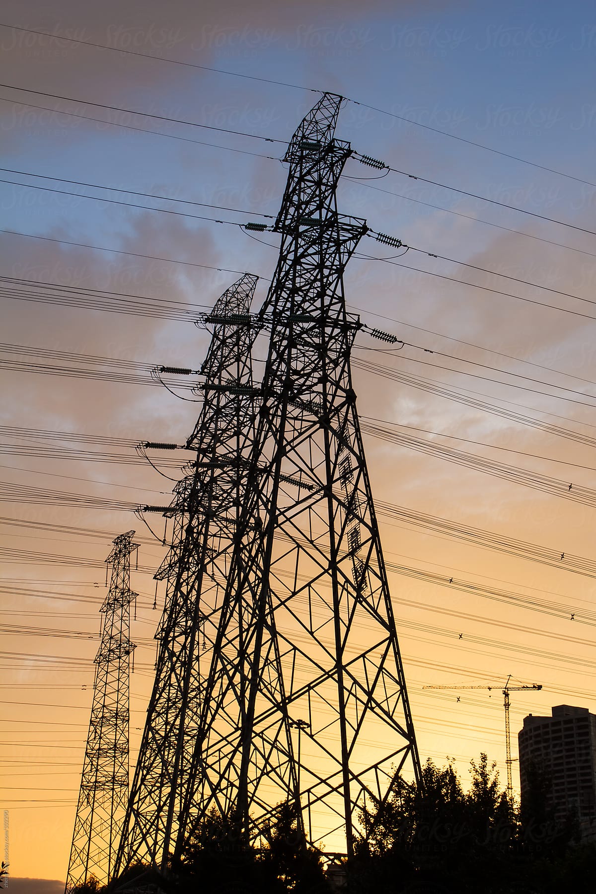 High voltage tower in city at dusk,Beijing