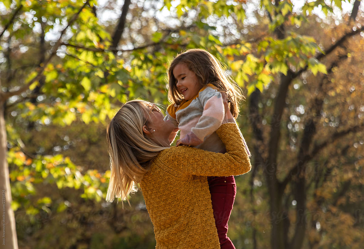 Mom And Daughter Sharing Special Moment In Autumn By Stocksy