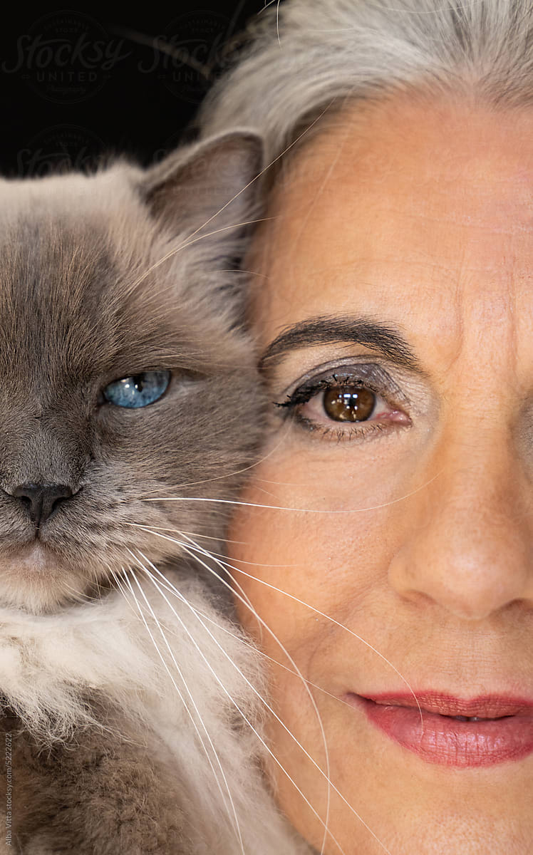 Mature woman with cat portrait eyes