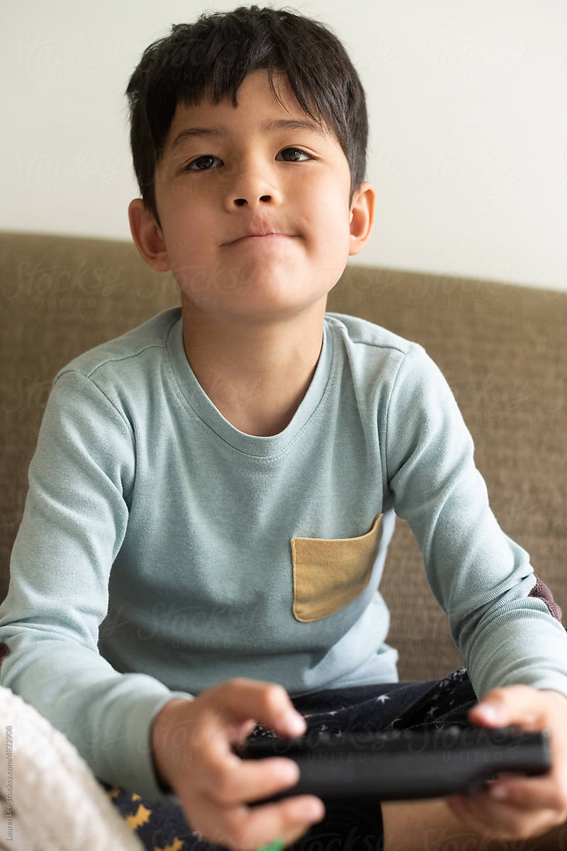 Kid playing video game