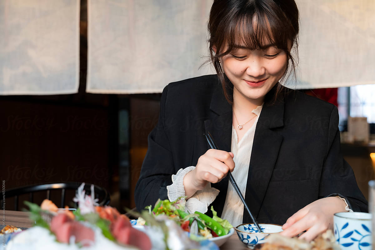 woman eating Japanese food
