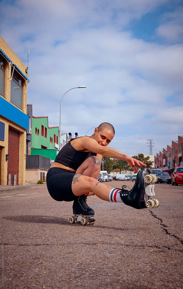 Urban portrait of a roller skater doing a trick