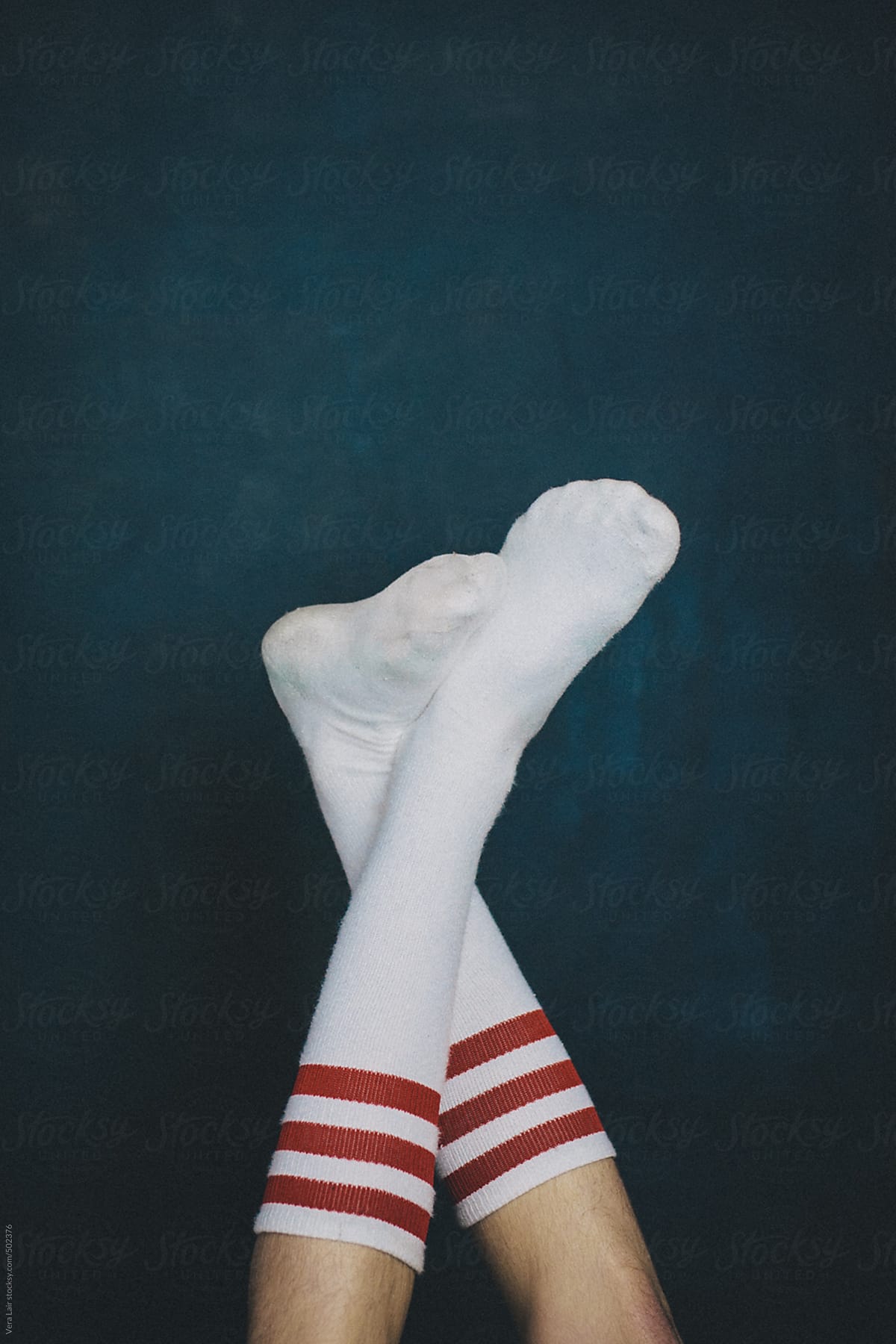 Feet upward, with white socks