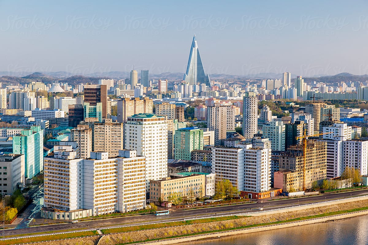 Democratic Peoples\'s Republic of Korea (DPRK), North Korea, Pyongyang, elevated city skyline including the Ryugyong hotel and Taedong river