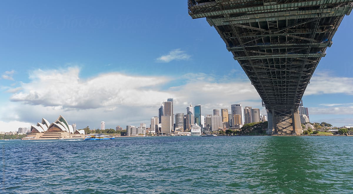 Sydney Opera House and city from beneath the Sydney Harbour Brid