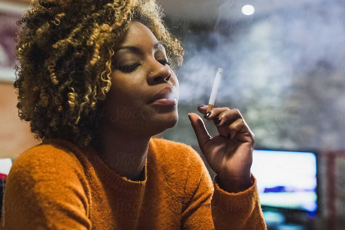 Brazilian Woman Smoking A Cigarette At Home By Mauro Grigollo Black