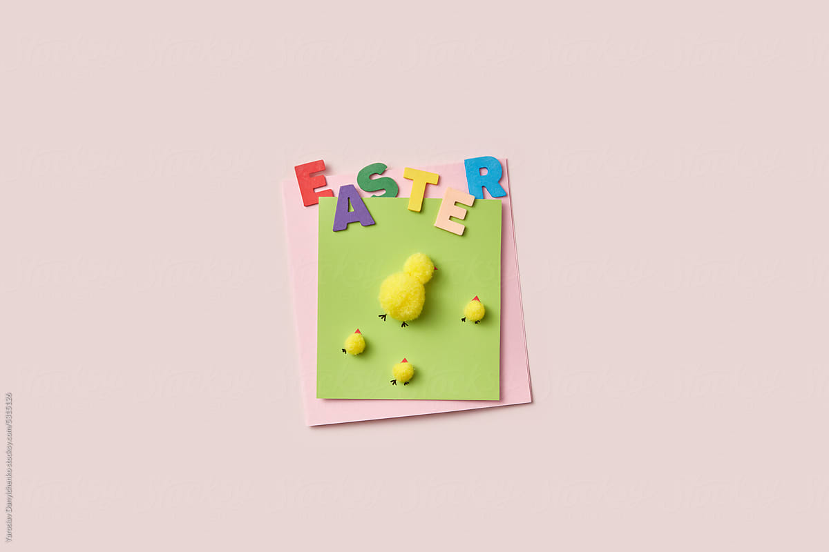 Easter greeting card with fluffy yellow chicks.